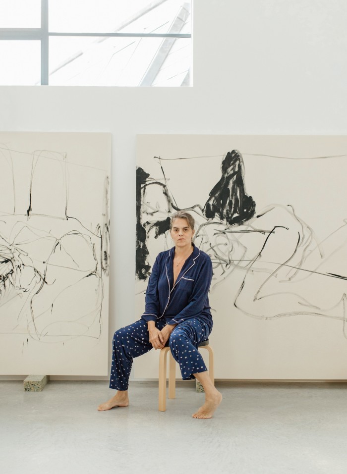 Tracey Emin in her studio in Margate – it will eventually become a museum and archive. The paintings behind her are works in progress