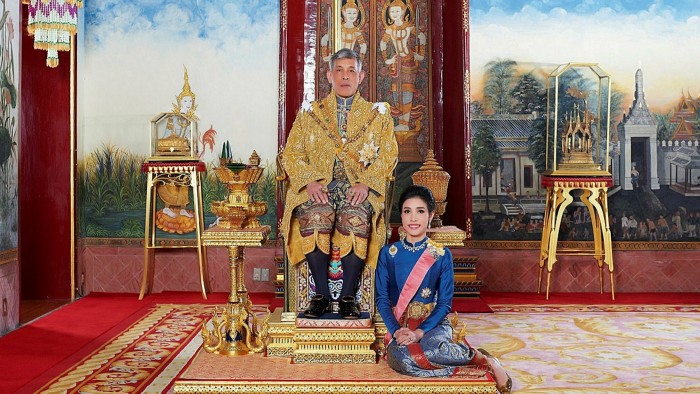 King Maha Vajiralongkorn and Major General Sineenat Wongvajirapakdi, the royal noble consort, at the Grand Palace in Bangkok