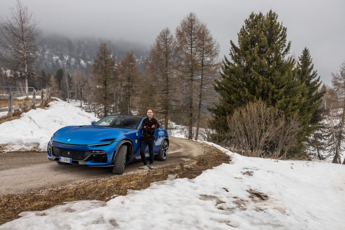 The author test-driving the car in the Dolomites