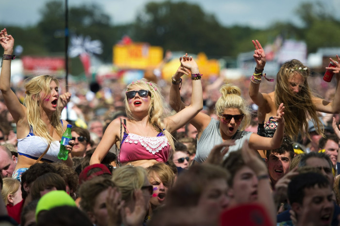 Festival goers at the Isle of Wight Festival, 2012