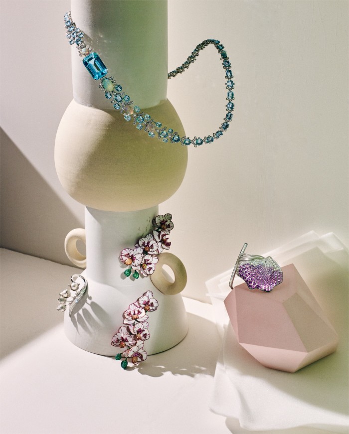Clockwise from top: Cartier platinum, aquamarine, opal and diamond [Sur]Naturel High Jewellery necklace. Tiffany & Co platinum, pink-sapphire and diamond Blue Book bracelet. Chopard titanium, white-opal, yellow-sapphire, garnet and tsavorite Red Carpet Collection earrings. Tasaki white-gold, baroque Akoya pearl and diamond Chorus Valley ring