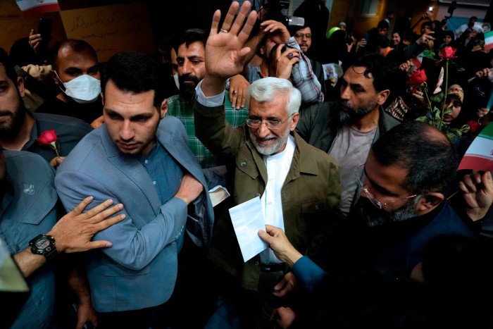Saeed Jalili waves to his supporters
