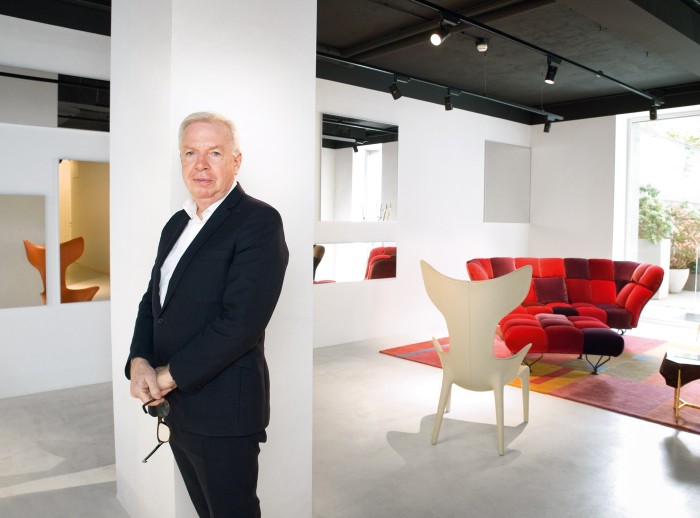 Driade artistic director David Chipperfield at the brand’s new Milan showroom, with (from left) leather and fibreglass Lou Read armchair by Philippe Starck with Eugeni Quitllet, from £3,996; steel and velvet 33 Cuscini sofa and pouf by Paolo Rizzatto, from £6,258 and £2,160 respectively; aluminium and composite Basalt side table by Fredrikson Stallard, from £3,264; and brass Acate coat hanger by Borek Sípek, from £1,254