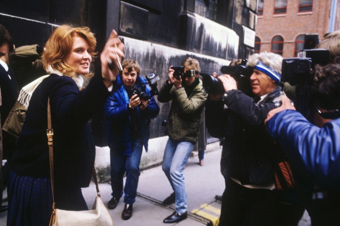Sarah Ferguson surrounded by press after the announcement of her engagement to Prince Andrew, March 1986