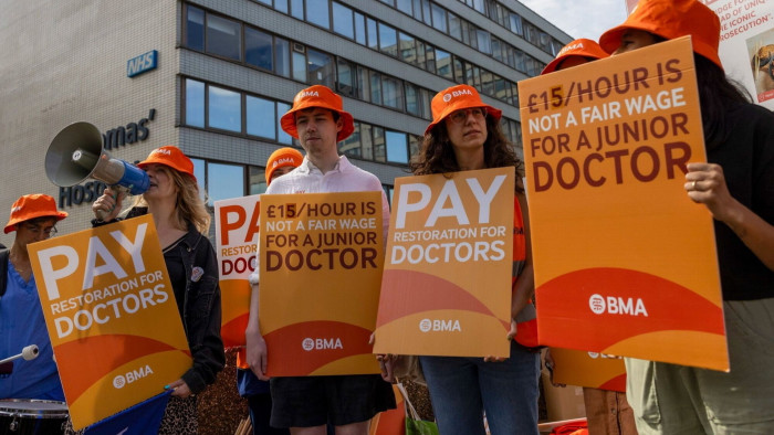 Striking junior doctors on a picket line outside London’s St Thomas’ Hospital on Thursday 