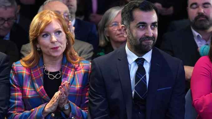 Humza Yousaf, right, sits next to Ash Regan in March last year