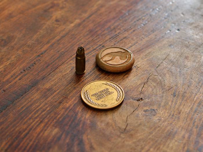 Parkour pioneer Sébastien Foucan’s Bond bullet and reminder coins 