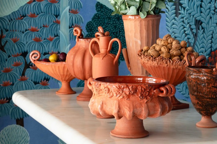 Ceramicist Frances Palmer has fashioned unglazed clay containers (from £1,800) inspired by the ancients – and artists Cy Twombly and Brâncuşi – to set against de Gournay’s exuberant Mughal paper collection