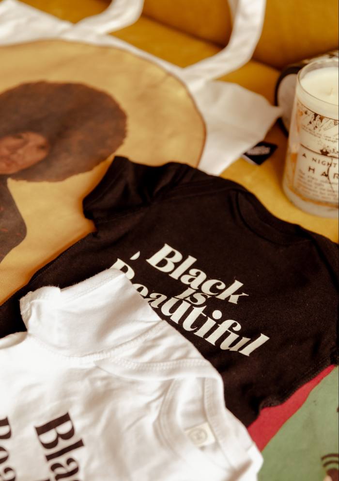 “Black Is Beautiful” onesies from The Studio Museum