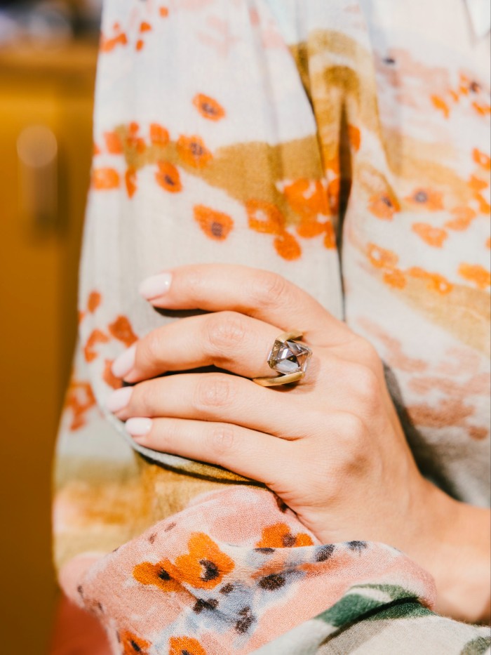 Yasmin wearing a Hemmerle white-gold, diamond, fancy brown-yellow diamond and bronze ring