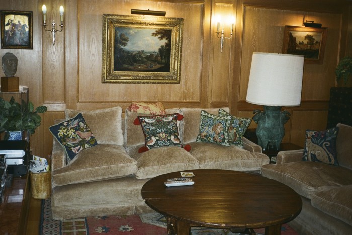 Sofas and cushions in the wood-panelled “new room”