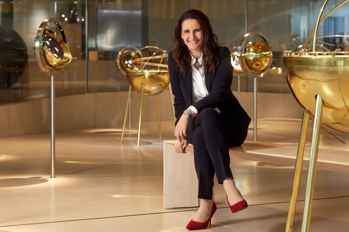 Resta sits inside the Audemars Piguet Musée Atelier surrounded by gold-coloured hemispheres on stands