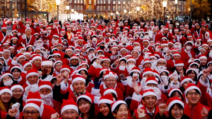 A roomful of Santas in Tokyo.
