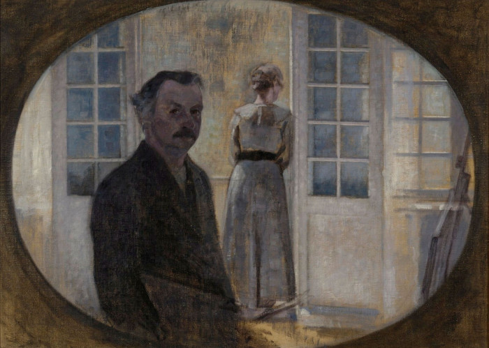 In a painting, a middle-aged man wearing a moustache and a brown jacket stares before him; behind him, a woman in a white dress looks through the window 