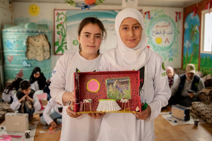 Haneen (left) and Hala, both 11, with their shoebox