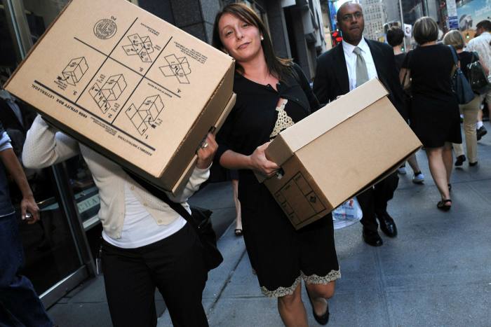 Women leave Lehman Brothers in 2008 after the bank filed for bankruptcy protection