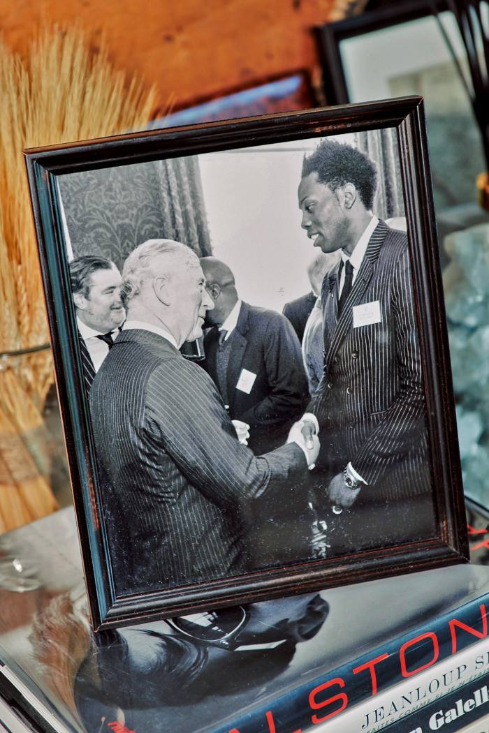 Meeting Prince Charles at Clarence House – Sauvage designed a collection for his royal visit to Ghana