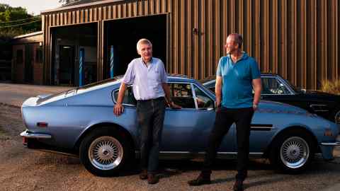 Rose, left, with Anderson and his Aston Martin V8 Vantage