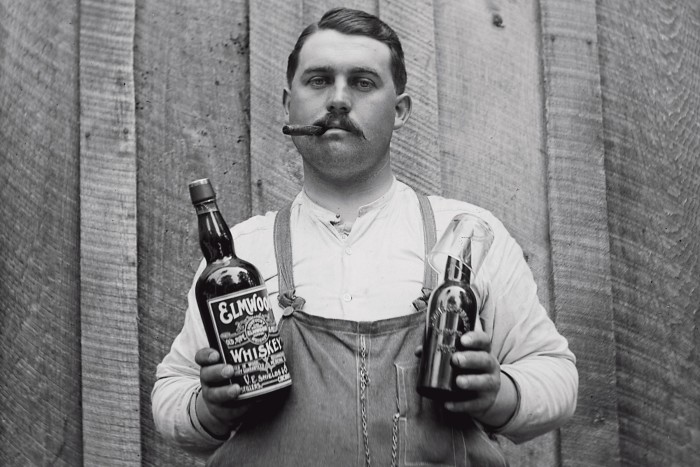 Lining up a beer and rye chaser, circa 1900