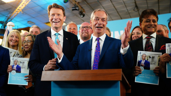 Reform UK leader Nigel Farage with party chair Richard Tice, left, in Merthyr Tydfil on Monday