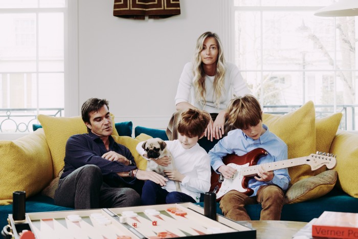Dawn Russell at home in London with her husband Jamie, Tinto the dog and children Leo and Alexander