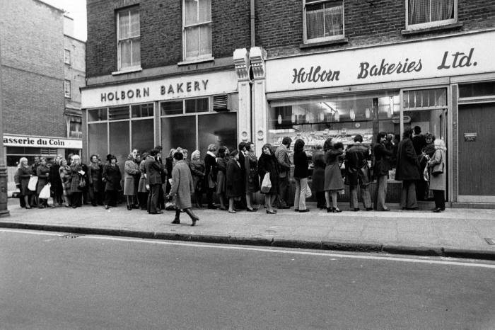 People queue for bread in Holborn, London, during an industrial dispute circa 1974