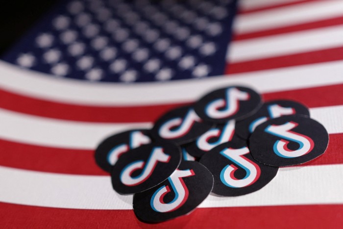 US flag and TikTok logos are seen in an illustration