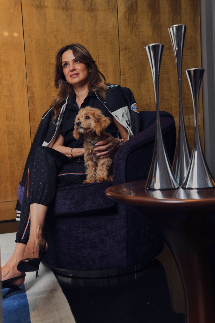 Hinduja at home with her dog Chino