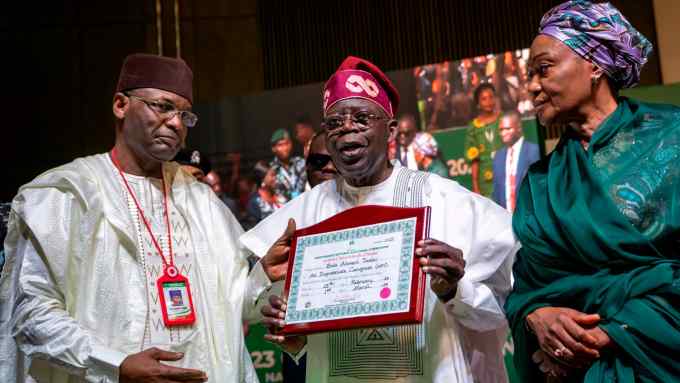Bola Tinubu, centre, at a ceremony in Abuja on March 1 where he was declared the winner of Nigeria’s election by the Independent National Electoral Commission
