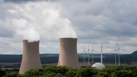 Steam rises from the cooling towers of the Grohnde nuclear power plant
