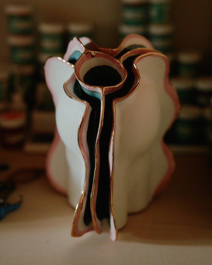 Piccolo 133, made from porcelain with fins wrapped in glaze, underglaze, and 22ct gold-lustre