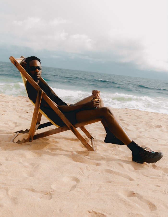 Mr Eazi on the beach in Cotonou