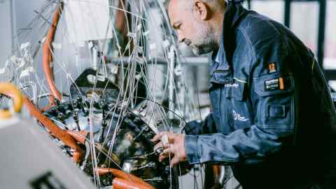 technician working with a rotodynamic heater