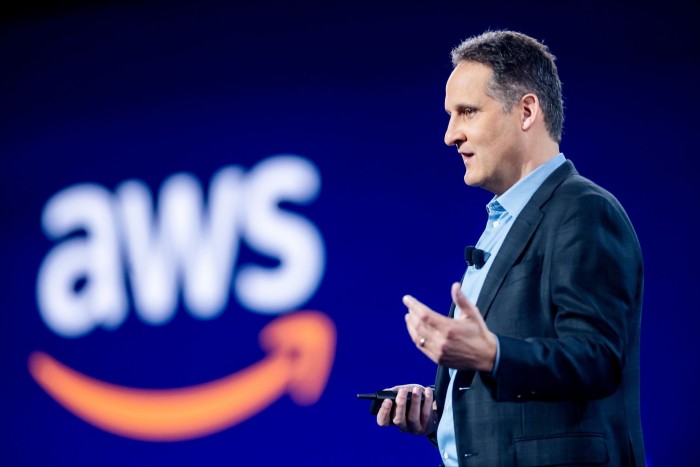 Adam Selipsky speaking on stage at a AWS conference