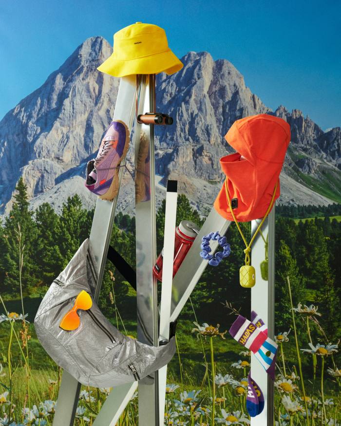Hiking accessories in front of a mountain range