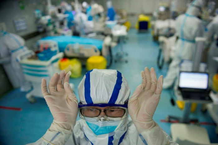 Staff at an intensive care unit treating Covid-19 patients at a hospital in Wuhan on February 22