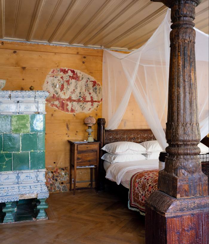 Harumi’s bedroom, with a column from Rajasthan at the end of the bed.