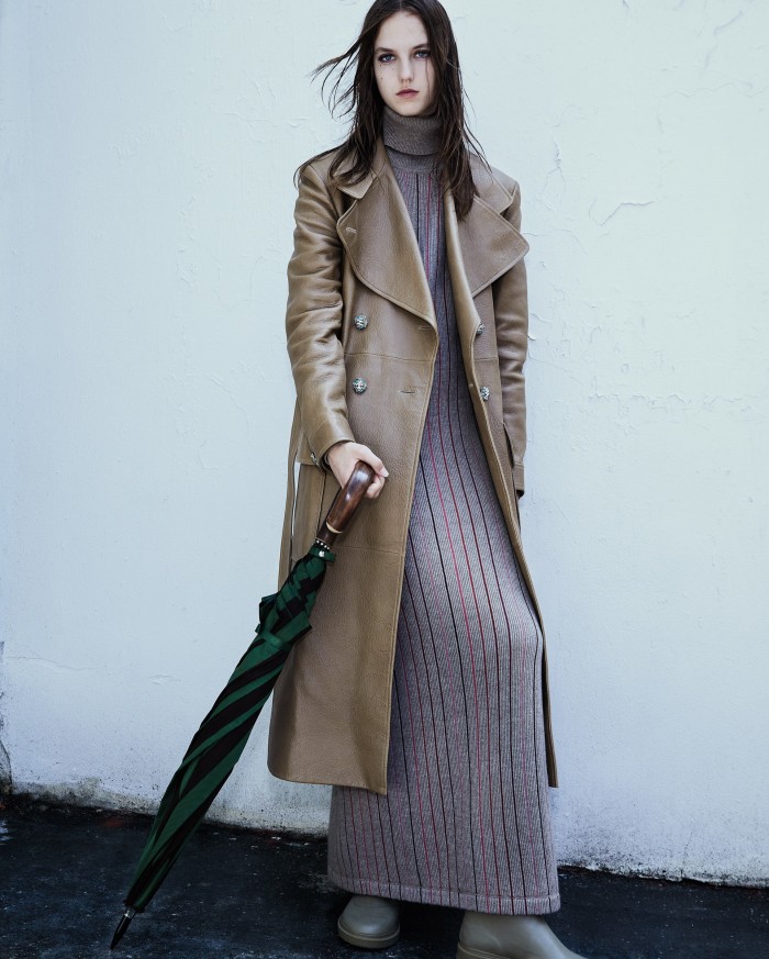 Chanel leather trench coat with jewelled buttons, £12,810, and rubber boots, £850. Barrie cashmere dress, £1,496. Francesco Maglia handmade malacca wood and metal-handled umbrella, £170