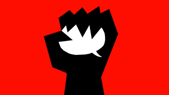 Illustration  of a black hand, on a red background, squeezing a white speech bubble