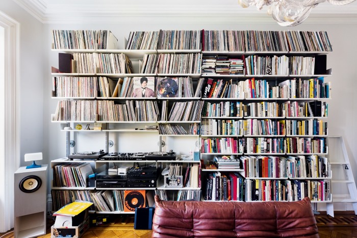 Vinyl, books and turntables in Adelman’s living room