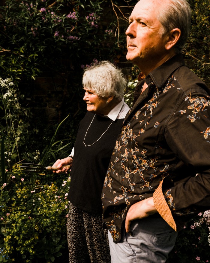 Joan and Adrian Dannatt in their London garden