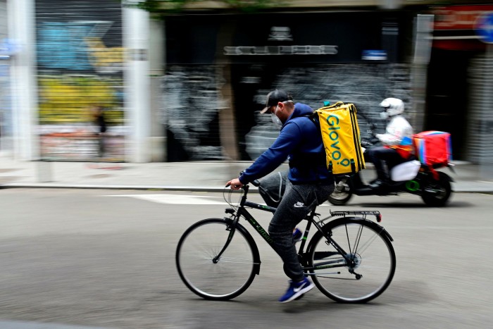Business cycle: a delivery rider for Spanish company Glovo in Madrid