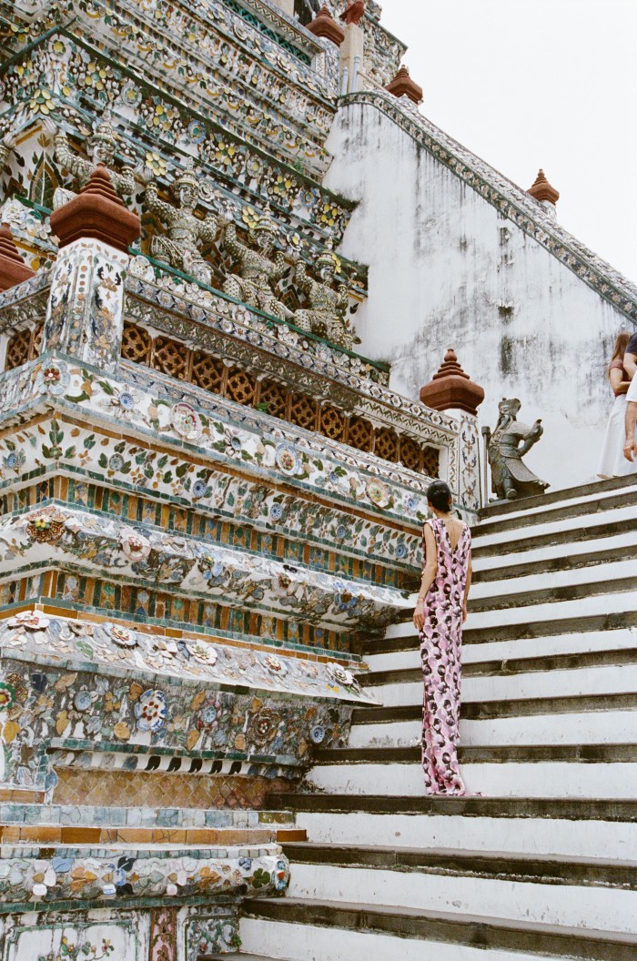 Actress and model Christine Gulastree, 27, wears Prada satin dress, £3,800. Wat Arun Ratchawararam Ratchawaramahawihan temple