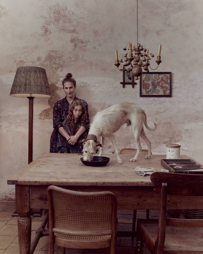 Sophie Wilson and her daughter Olive in the dining room of their Lincolnshire home – with their dog Pelham