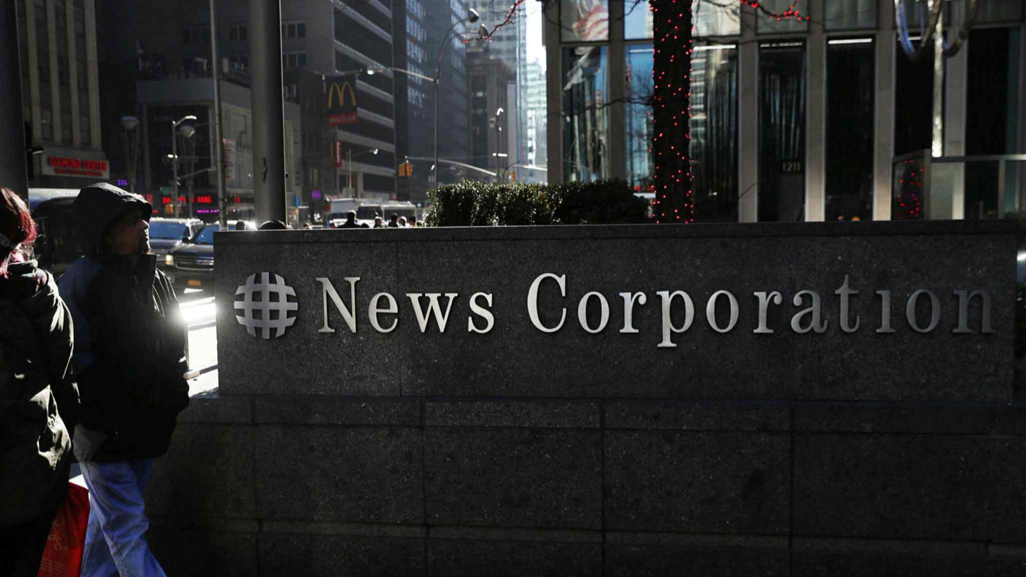 Former New York Post editor claims harassment in News Corp lawsuit
