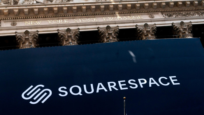 A Squarespace banner in front of the New York Stock Exchange