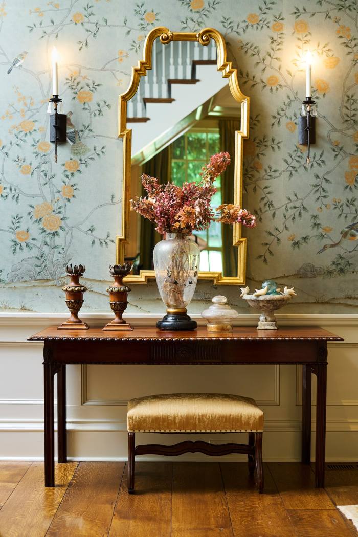 De Gournay wallpaper and an antique apothecary jar in her home