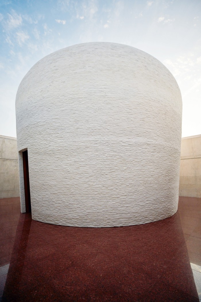 Turrell’s Skyspace is a white marble dome set atop a temple-like structure