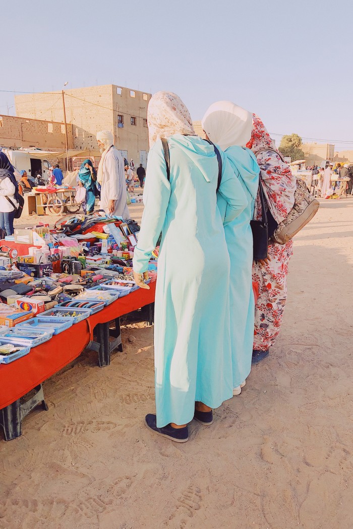 Shoppers at a market stall