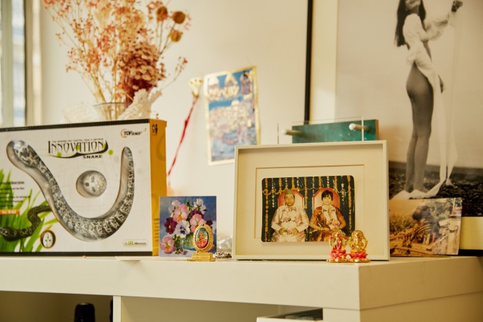 Family photographs and personal objects in Lele’s atelier